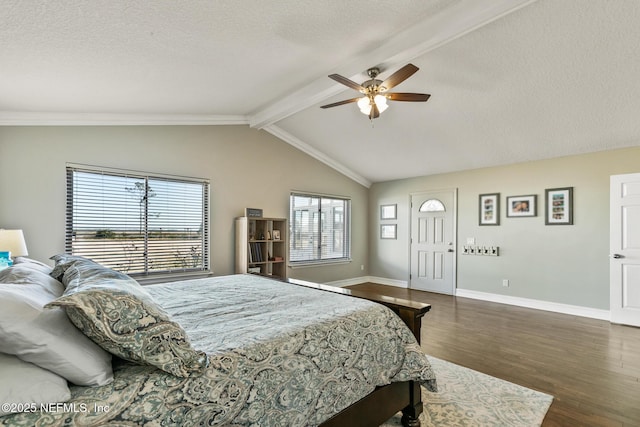 bedroom featuring dark wood-type flooring, ceiling fan, lofted ceiling with beams, and a textured ceiling