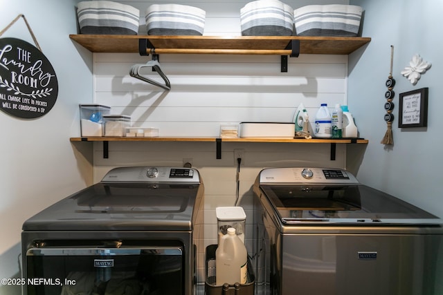 laundry room featuring washing machine and clothes dryer