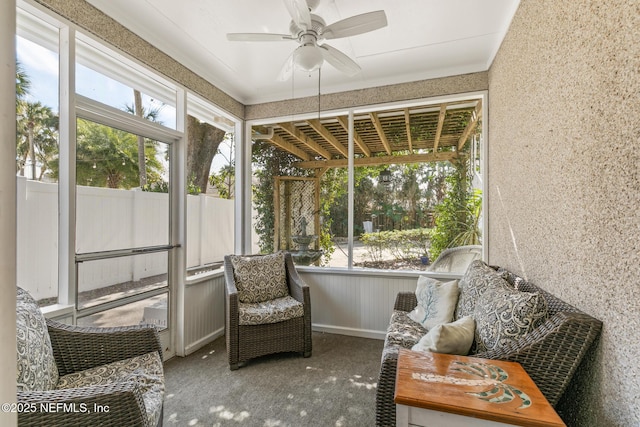 sunroom / solarium with ceiling fan