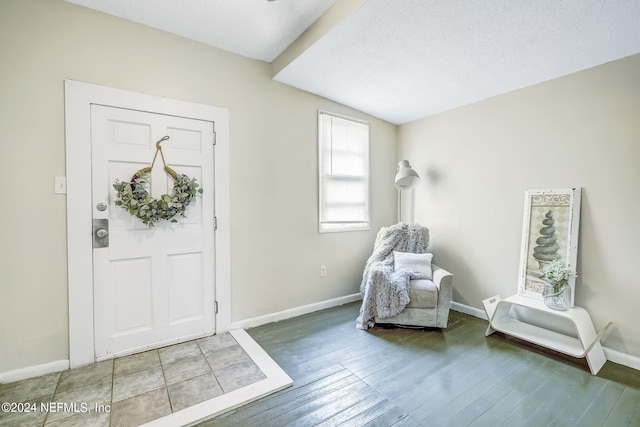 entrance foyer featuring hardwood / wood-style flooring