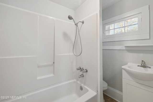 full bathroom with vanity, bathtub / shower combination, and toilet