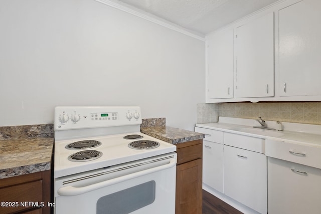 kitchen featuring white electric range, tasteful backsplash, white cabinetry, sink, and ornamental molding