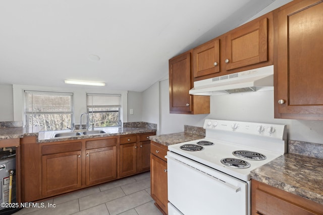 kitchen with dishwashing machine, sink, light tile patterned floors, white range with electric stovetop, and vaulted ceiling