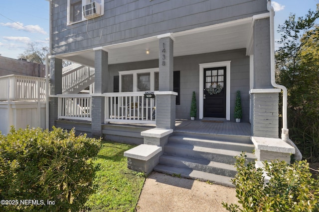 entrance to property with covered porch