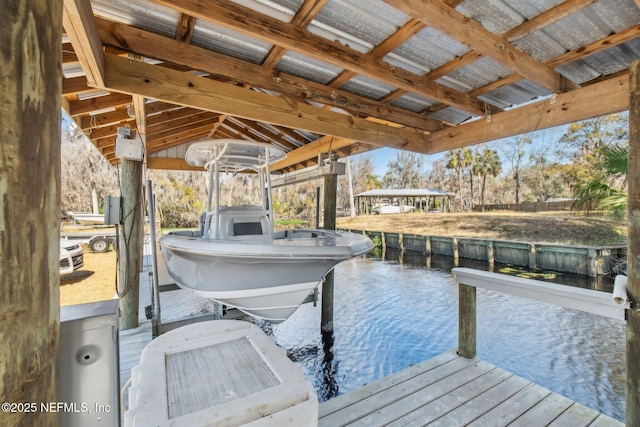 view of dock with a water view