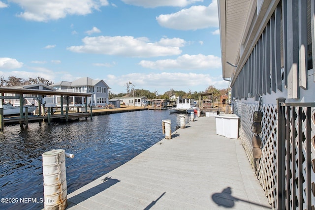 view of dock with a water view