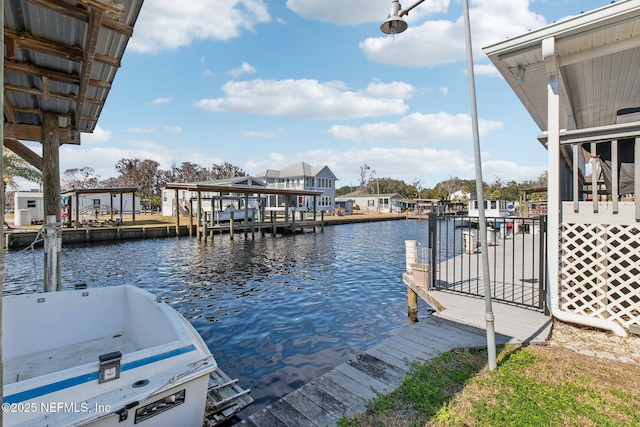 dock area with a water view