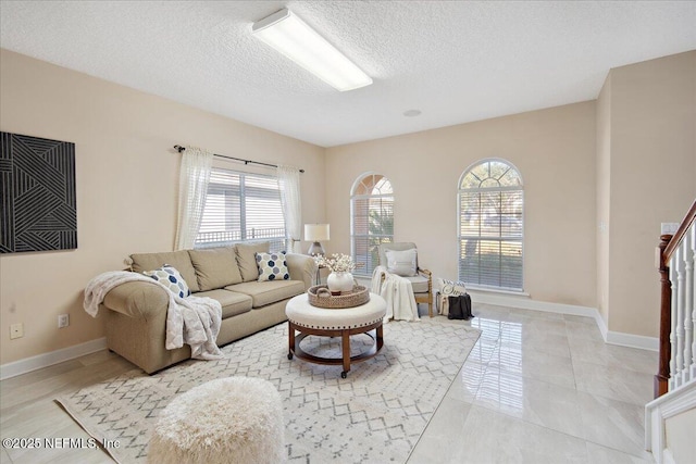 living room featuring a textured ceiling