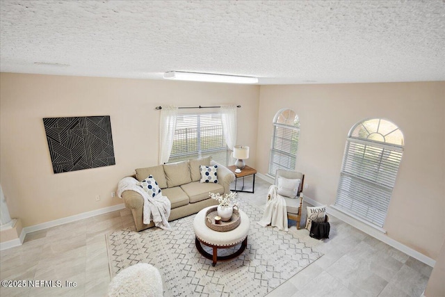 living room featuring a textured ceiling