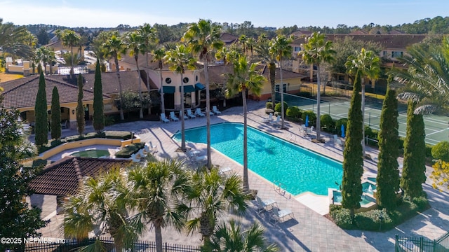 view of swimming pool with a patio and a jacuzzi