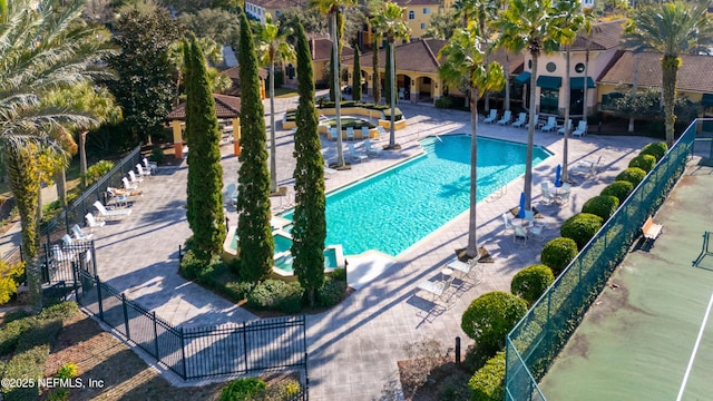 view of swimming pool with a patio area