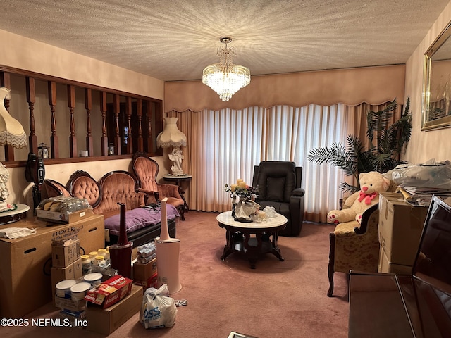 sitting room with a notable chandelier, carpet floors, and a textured ceiling