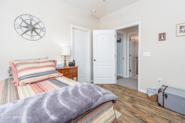 bedroom with wood-type flooring