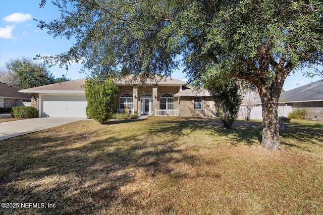 single story home with a garage and a front yard