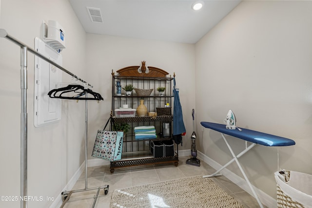 misc room featuring light tile patterned floors