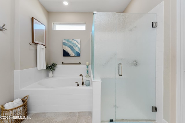 bathroom with shower with separate bathtub and tile patterned floors