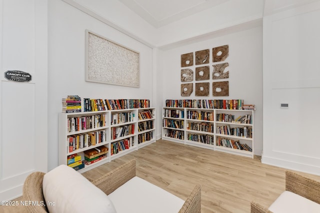 living area featuring hardwood / wood-style floors