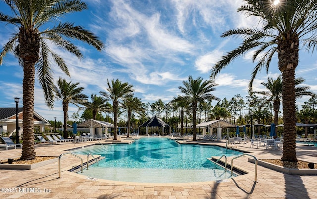 view of swimming pool with a gazebo and a patio