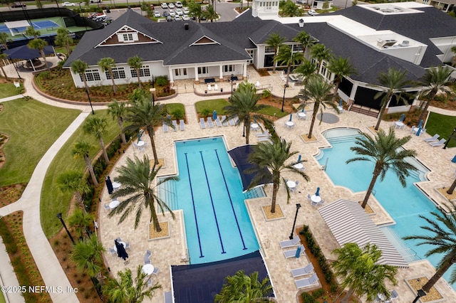 view of swimming pool with a patio