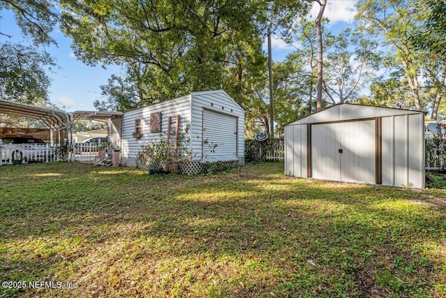 view of yard featuring a carport and a shed