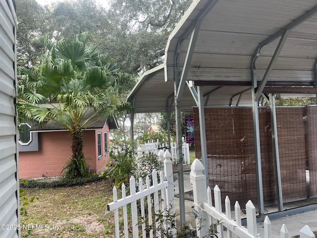 view of property exterior with a carport