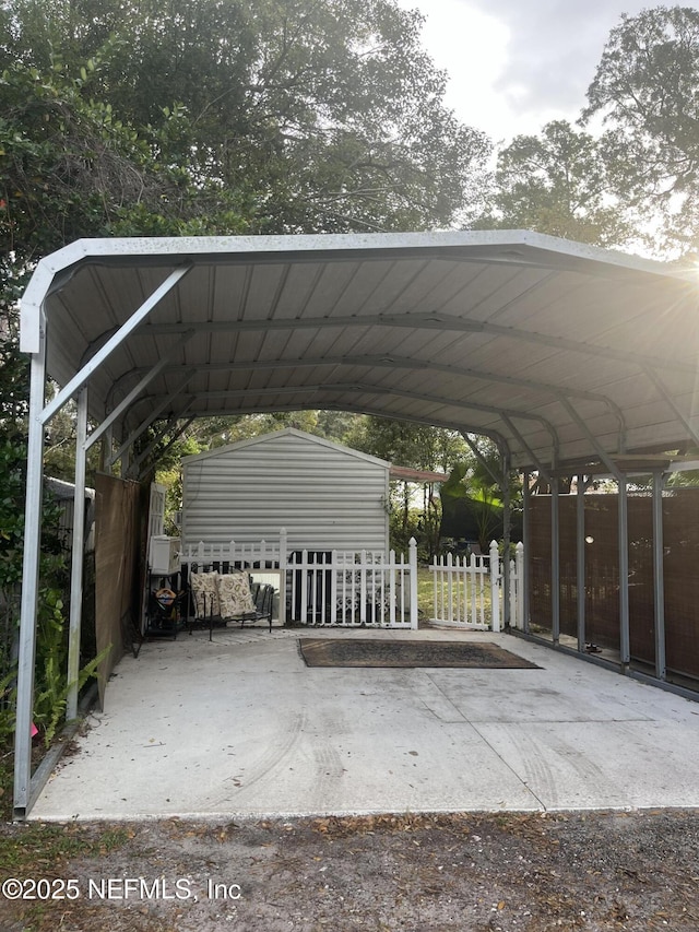 view of parking / parking lot featuring a carport