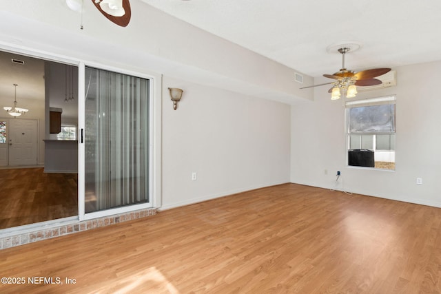 unfurnished living room with hardwood / wood-style floors and ceiling fan