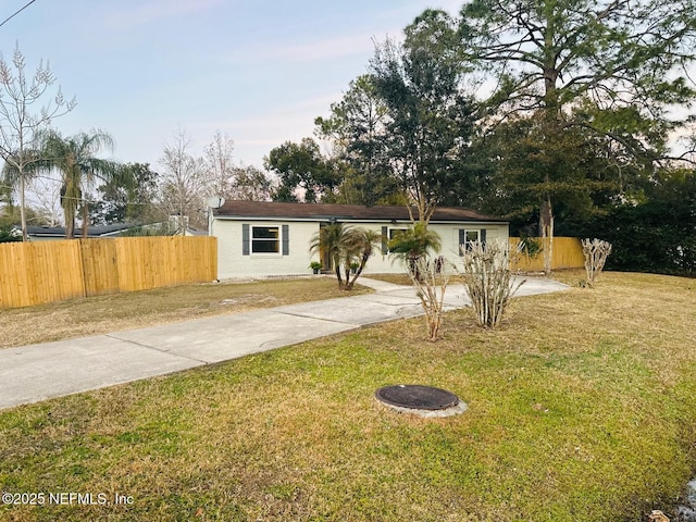 view of front facade with a front lawn