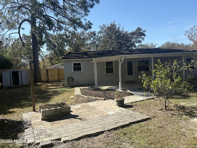 rear view of property with a patio