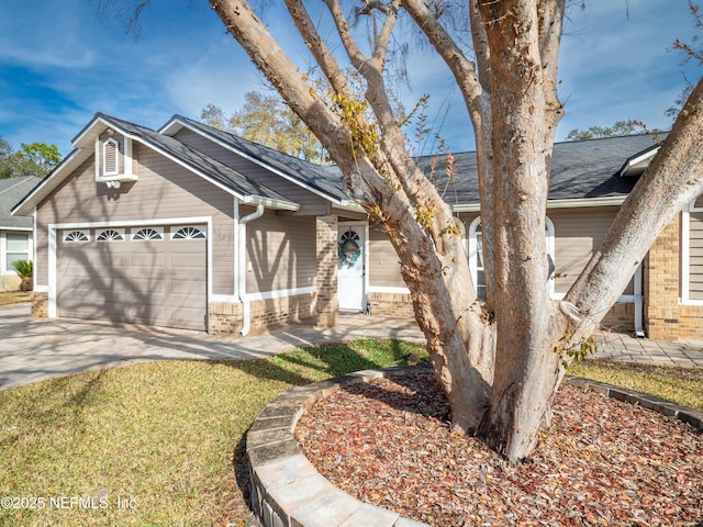 view of front of home with a garage