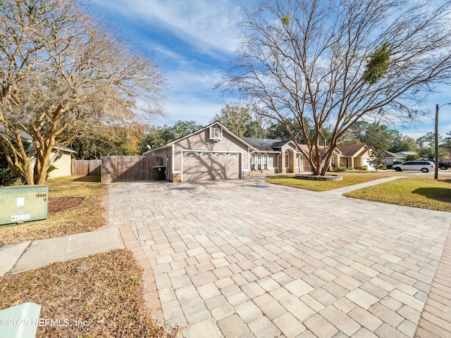 view of home's exterior featuring a garage and a lawn