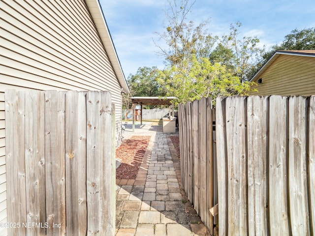 view of property exterior featuring a patio