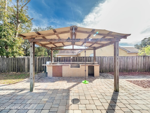 view of patio featuring a pergola