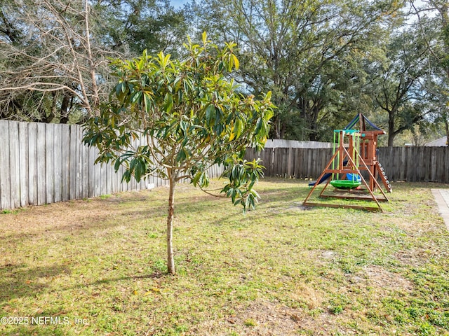 view of yard with a playground