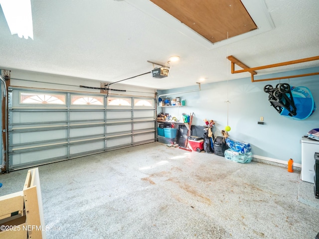 garage featuring a garage door opener