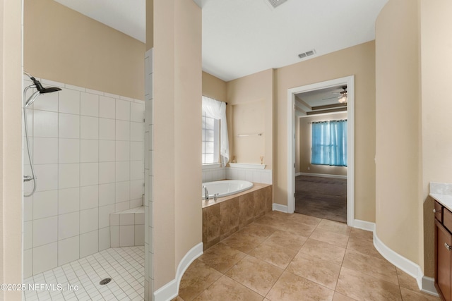 bathroom featuring vanity, ceiling fan, tile patterned flooring, and separate shower and tub