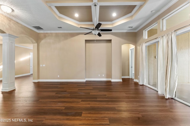 interior space with dark hardwood / wood-style flooring, ornamental molding, ceiling fan, and ornate columns