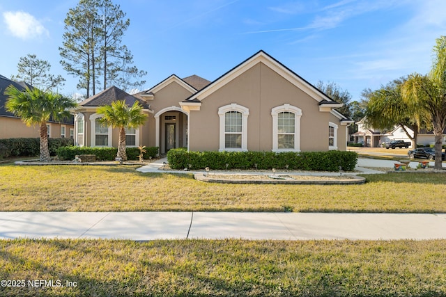 view of front of house with a front lawn