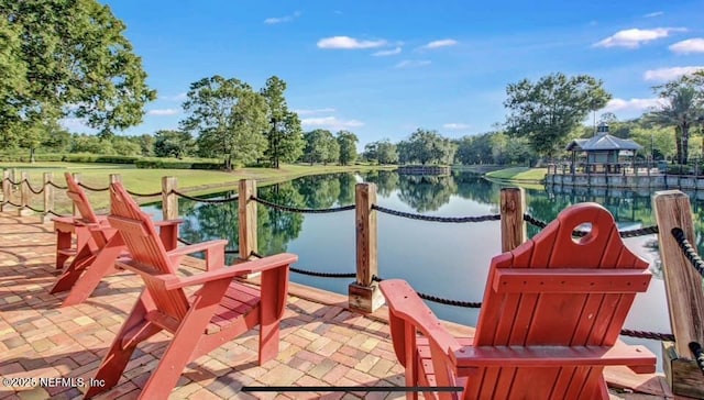 dock area with a water view