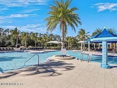 view of pool with a patio area