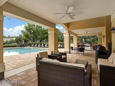 view of patio / terrace with outdoor lounge area and ceiling fan