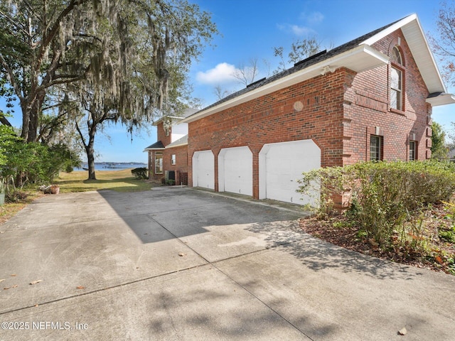 view of property exterior featuring a garage