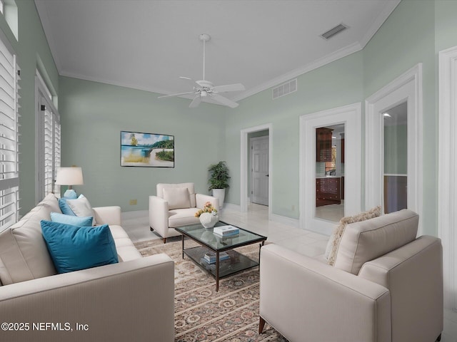 living room with crown molding and ceiling fan