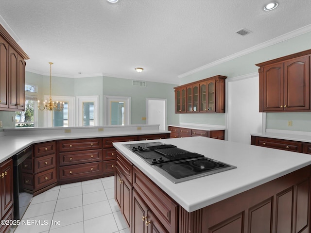 kitchen with light tile patterned flooring, decorative light fixtures, dishwasher, a chandelier, and gas cooktop