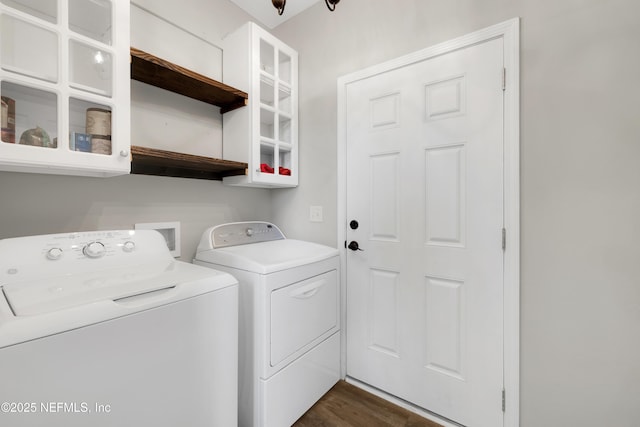 laundry room featuring dark wood-type flooring and washing machine and clothes dryer