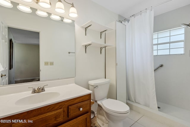 bathroom with vanity, tile patterned flooring, curtained shower, and toilet