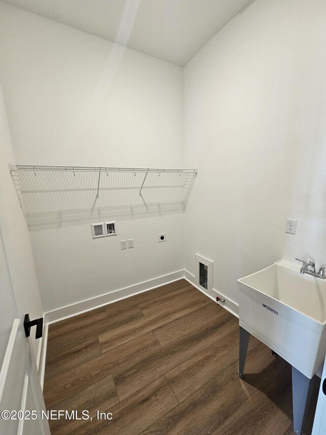 101 Erlking Ct, Saint Johns, FL 32259 - washroom with washer hookup, dark wood-style flooring, hookup for an electric dryer, and hookup for a gas dryer