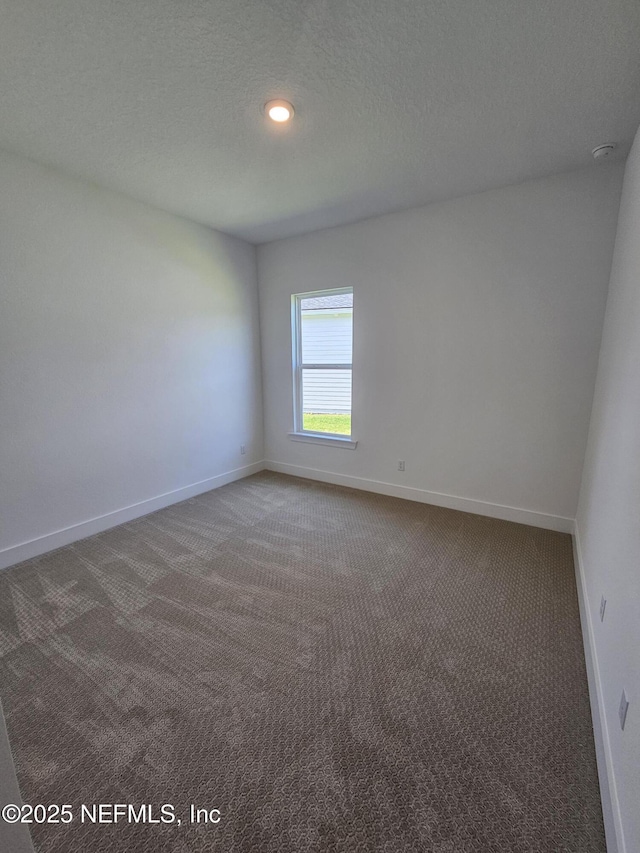 101 Erlking Ct, Saint Johns, FL 32259 - spare room with carpet, a textured ceiling, and recessed lighting