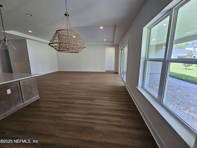 101 Erlking Ct, Saint Johns, FL 32259 - unfurnished dining area with dark wood-type flooring, a chandelier, recessed lighting, and a textured ceiling