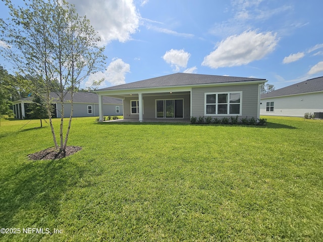 101 Erlking Ct, Saint Johns, FL 32259 - rear view of house with a lawn